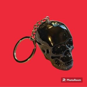 Skull resin keychain with silver foil. Handmade